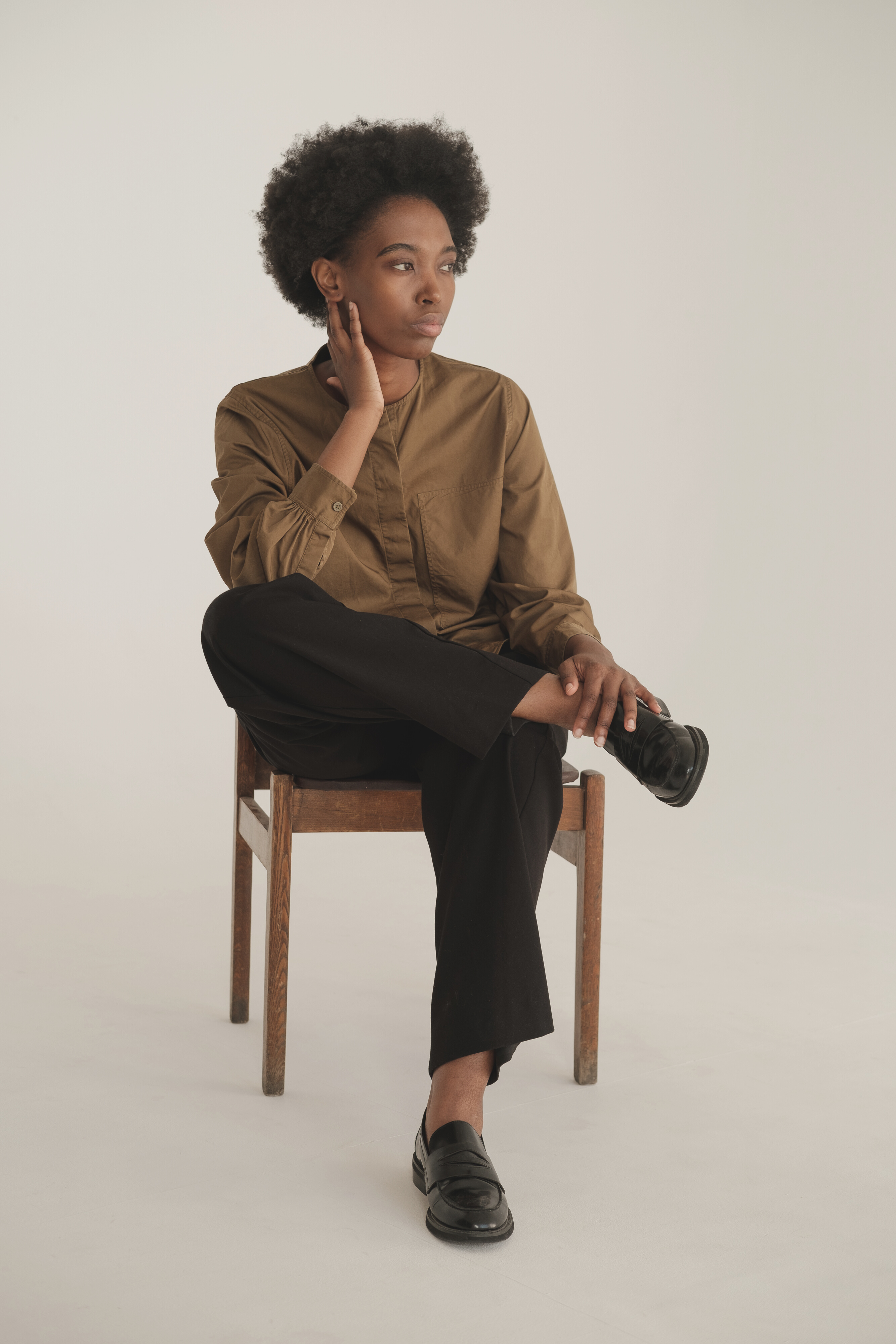 Woman in Casual Brown Dress Shirt and Slacks